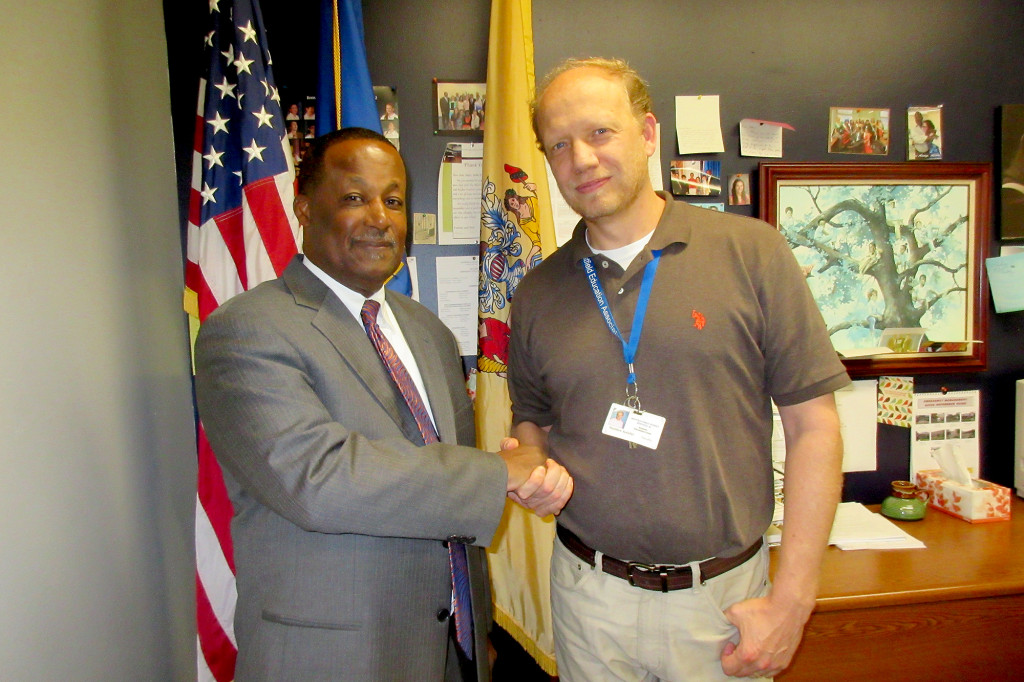(above) Kalafat’s Principal, Stewart Carey (left), congratulated the English and Journalism teacher who has been on staff since 2009. “We here in Westfield, and particularly at Roosevelt, congratulate Mr. Kalafat on his heroic efforts. He has set a fine example for the type of individual that we would like our students to emulate as they develop into adulthood,” stated Carey.
