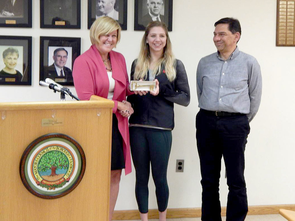 (above) Fanwood resident Ana Bogdanovski, accompanied her was her dad, received the Key to the Borough from Mayor Colleen Mahr. Ana, who has dual US/Macedonian citizenship, was the flag bearer for the Macedonian Olympic team in Rio this summer. Ana's sport is swimming. She was a swimmer while attending the Union County Magnet School in Scotch Plains and was on the YMCA team as well. While attending Johns Hopkins University, she won several NCAA honors and holds 10 NCAA titles. She is currently a medical student at Rutgers Newark.