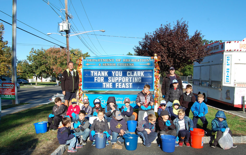 (above) Clark Pack 145 Cub Scouts gathered the morning after the UNICO feast to clean the entire parking lot and grounds of the municipal grounds. The yearly event is headed by master Scott McCabe. Clark Recreation Director thanked the scouts for their community service.