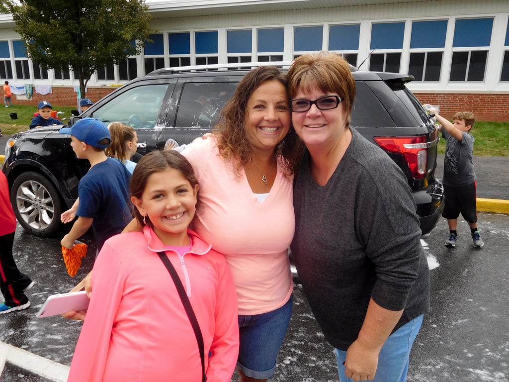(above) Mrs. Guzman stopped in to the car wash where she took a group photograph with the KKids and the advisors. She mentioned that the family is very appreciative of Valley Road School’s help by students, staff, and parents.