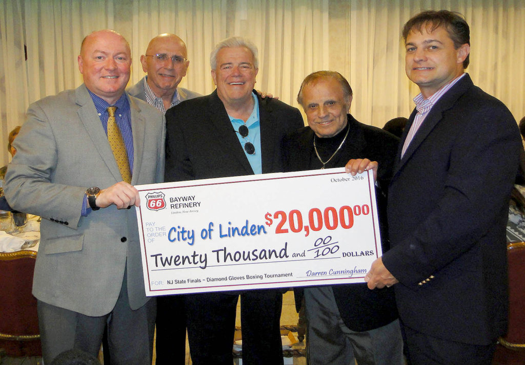 (above l-r) Darren Cunningham, Phillips 66 Bayway Refinery Manager; Al Volpe, Linden Boxing Association President; Gary Luciano, Linden Boxing Association; Tony Orlando, Founder of the Linden Boxing Association, Inc.; and Neil Spracklen, Phillips 66 Bayway Refinery Operations Manager.