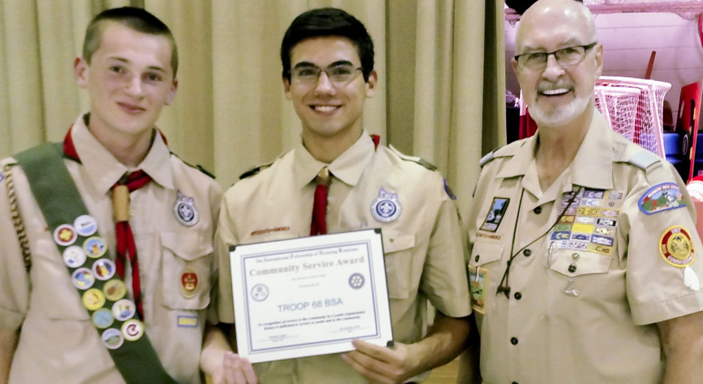(above) The Rotary Community Service Award was presented by Dr. Hal Daume, Rotary Club representative and Scouting Commissioner, to Senior Patrol Leader Doug Ladzinski and Assistant Senior Patrol Leader for Service Kyle Engemann.