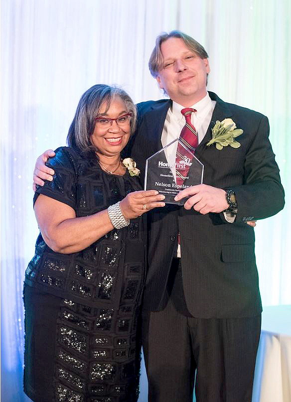 (above l-r) Board Member Karen Oliver Moore presents Allstate Exclusive Agent Nelson Espeland from Scotch Plains with the 2016 Homefirst Hero Award. Photo by: Alyssa Gioia